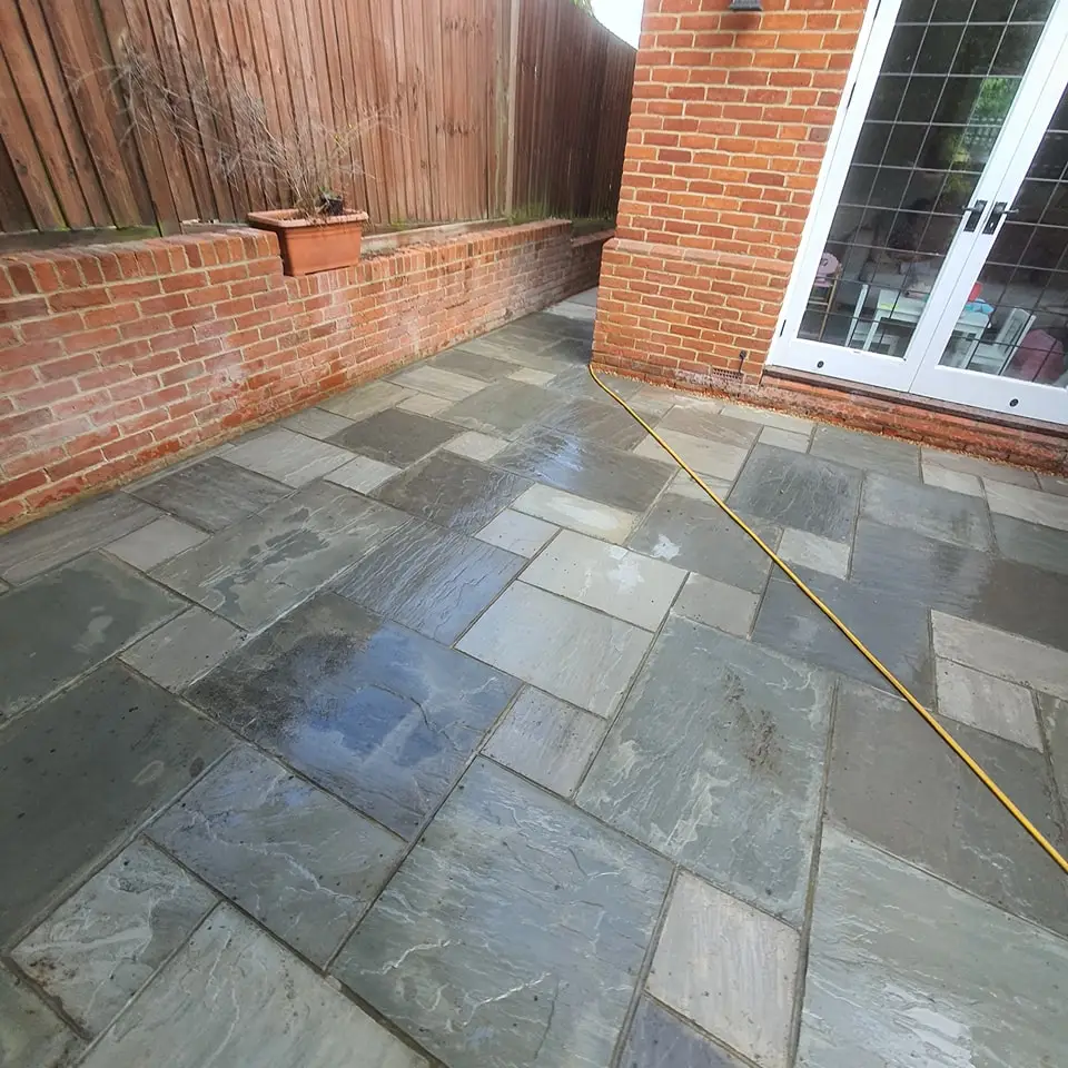 Custom driveway design in Woking with paving patterns and borders