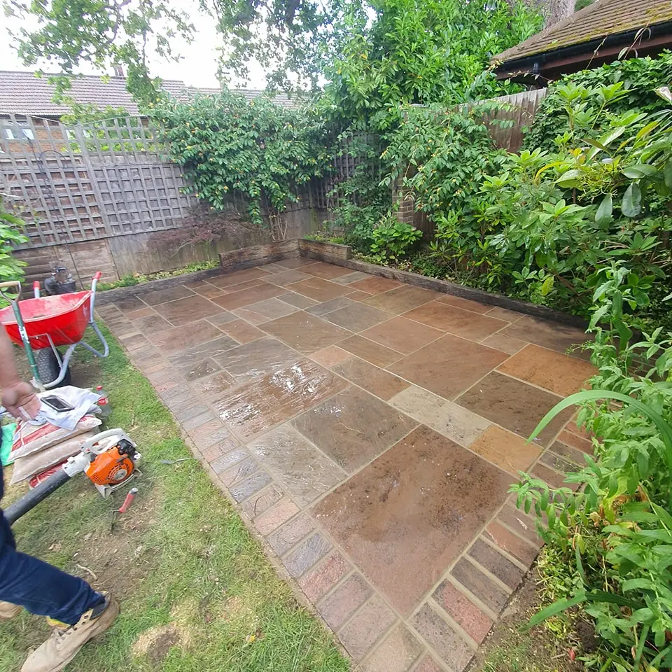 Complete landscaping project in Woking with patio, lawn, and fencing
