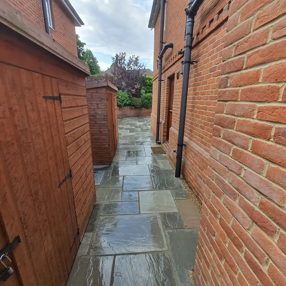 Garden patio in Woking with steps and decorative edging installed by specialists