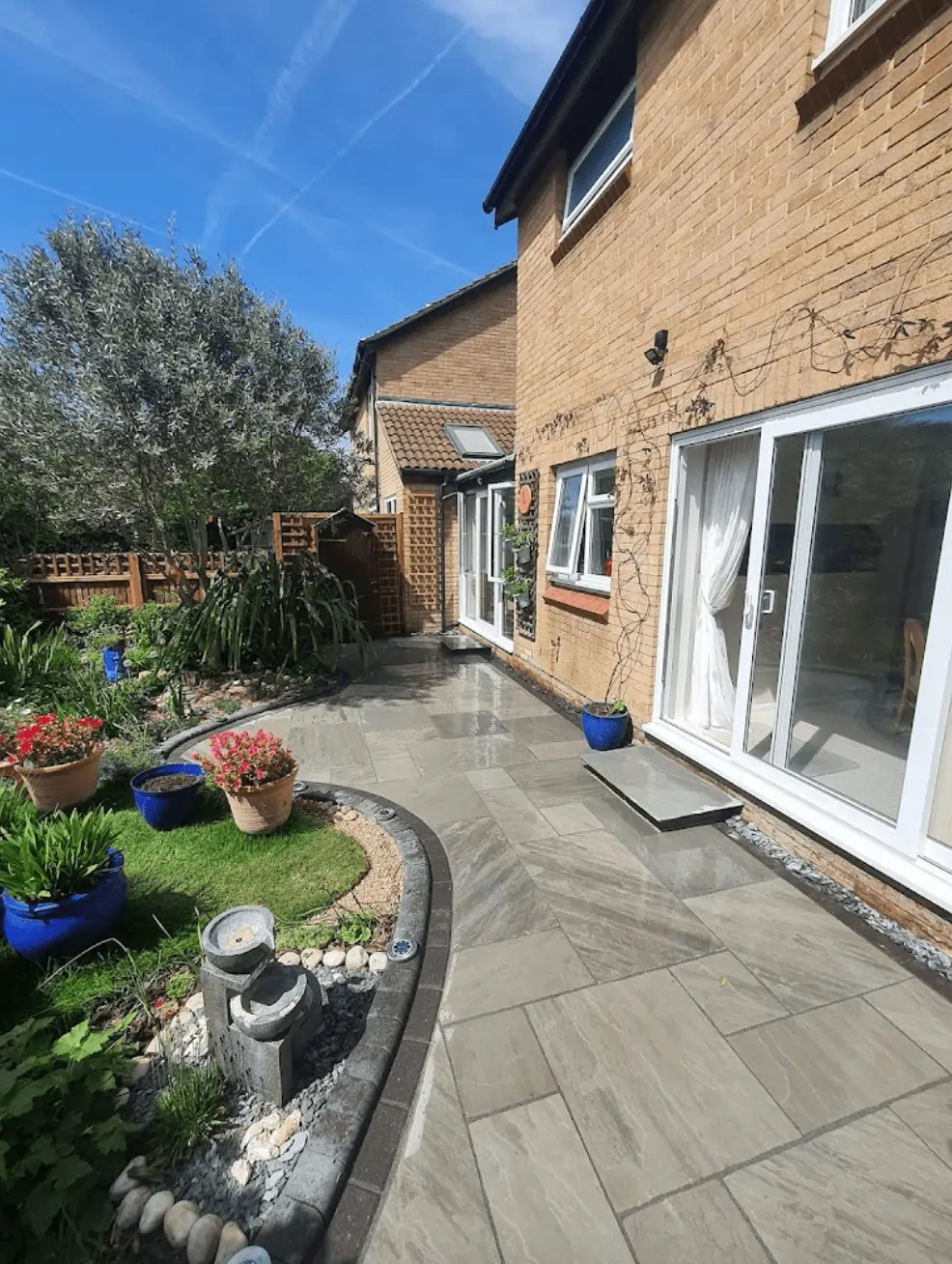 Block paving patio installation in Woking by Prestige Garden Maintenance creating a modern and durable outdoor space.